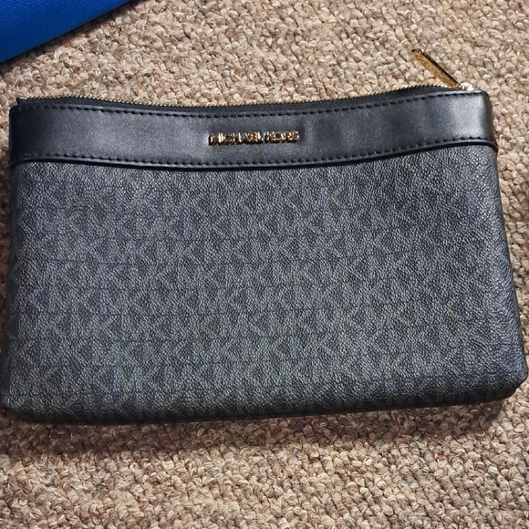 Michael Kors Handbags - Michael Kors Black and Gold Pouch